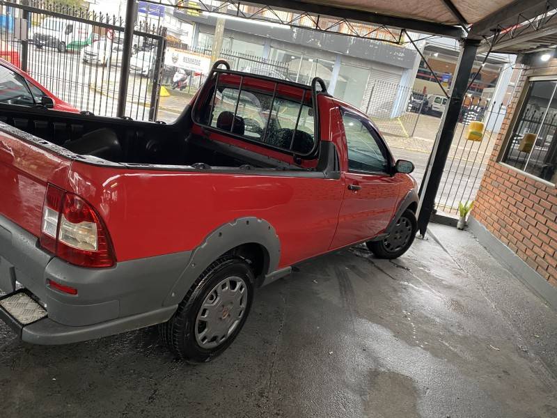 FIAT - STRADA - 2009/2010 - Vermelha - R$ 35.900,00